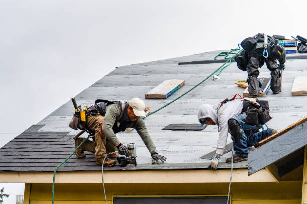 Professional Gutter Installation technician working in Woodbourne, NY